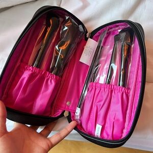 Makeup bag with unused makeup brushes